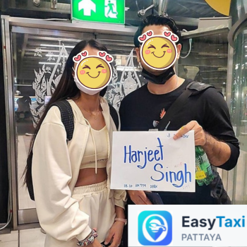 TaxiTh driver at Bangkok airport pickup point